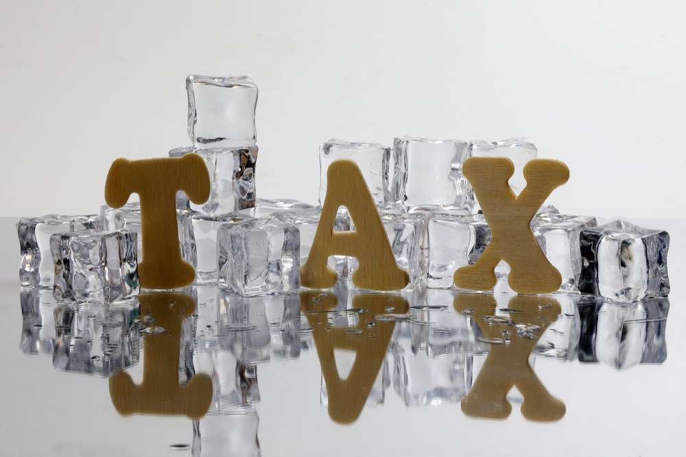 Tax,Alphabet,Ice,Cube,Freeze,Cool,On,White,Background