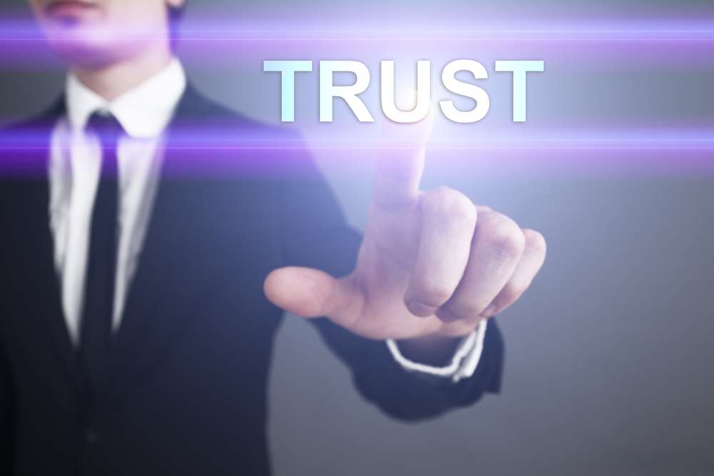 Businessman,Pressing,Touch,Screen,Interface,And,Select,”trust”.,Business,Concept.